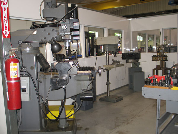 A view across the machine shop. Note particularly the nifty Rotex 18-station punch at far right.
