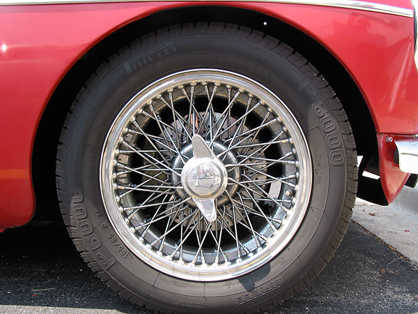 15 inch MGC 70-spoke wire wheels with Pirelli 185-65 tires.