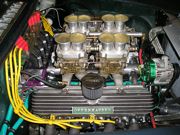 Oldsmobile 215cid V8 with four Weber DCNF 40mm carburetors and Offenhauser finned aluminum valve covers.