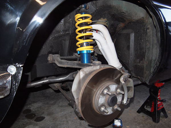 Mazda Miata suspension and brakes, plus AFCO coilover shock absorbers with 375lb/in coil springs.