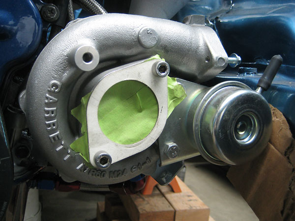 Garrett GT2560R turbocharger before removal of internal waste gate. (Notice vacuum port.)