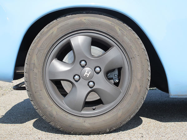 Spacers and longer studs were required to fit these 2000 Mercury Cougar wheels.