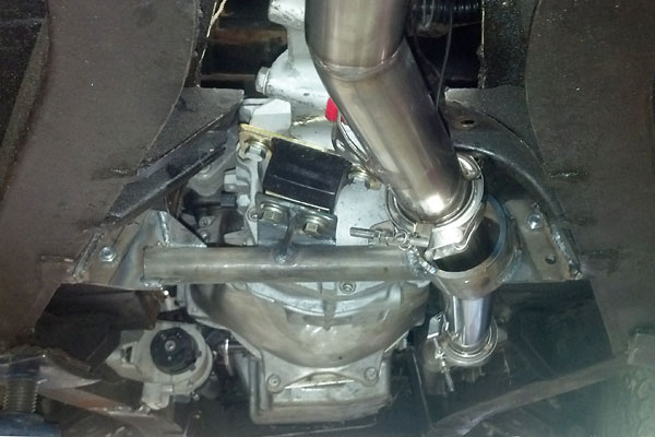 2.25 inch stainless steel exhaust tube passing through the rear transmission mount.