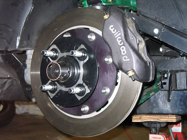 Wilwood 4-pot calipers and 12.25in vented rotors. (Front hubs redrilled to Ford pattern.)