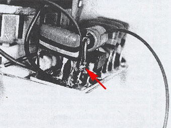 Photo 4: Lead soldered to chip #4 terminal. (arrow)