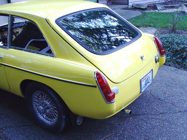 Rear valance and license holder. Single exhaust on driver side.