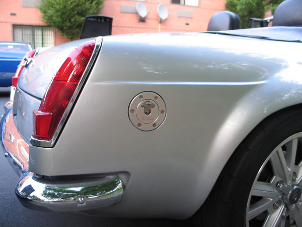 Recessed ATL fuel cap (moved from rear of car to the right quarter-fender).